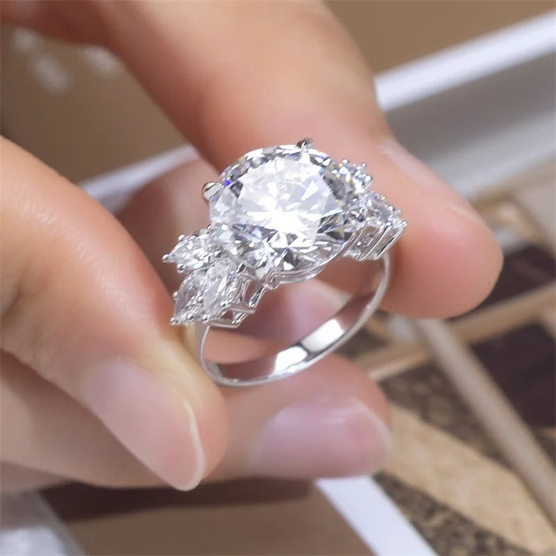18K Gold Lab-Grown Diamond  Ring  Round Center with Pear Side Stones for Engagement