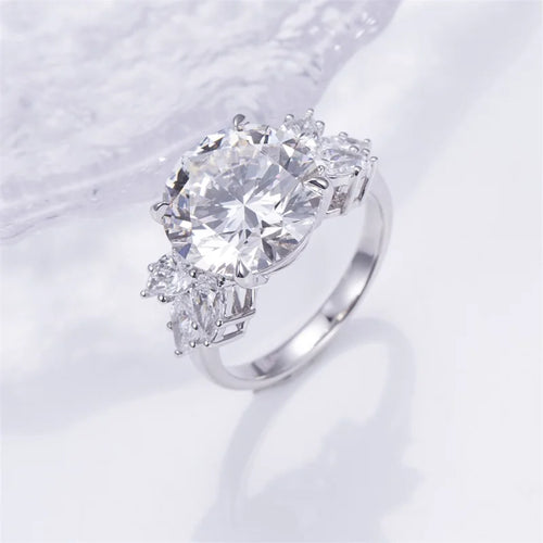 18K Gold Lab-Grown Diamond  Ring  Round Center with Pear Side Stones for Engagement