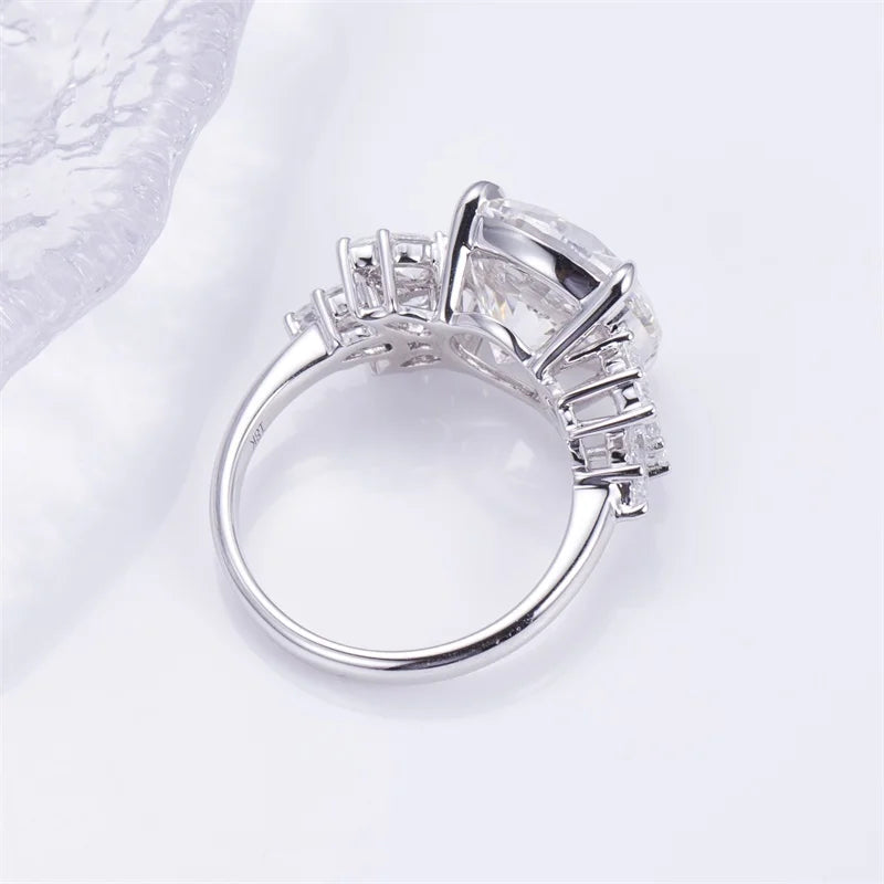 18K Gold Lab-Grown Diamond  Ring  Round Center with Pear Side Stones for Engagement